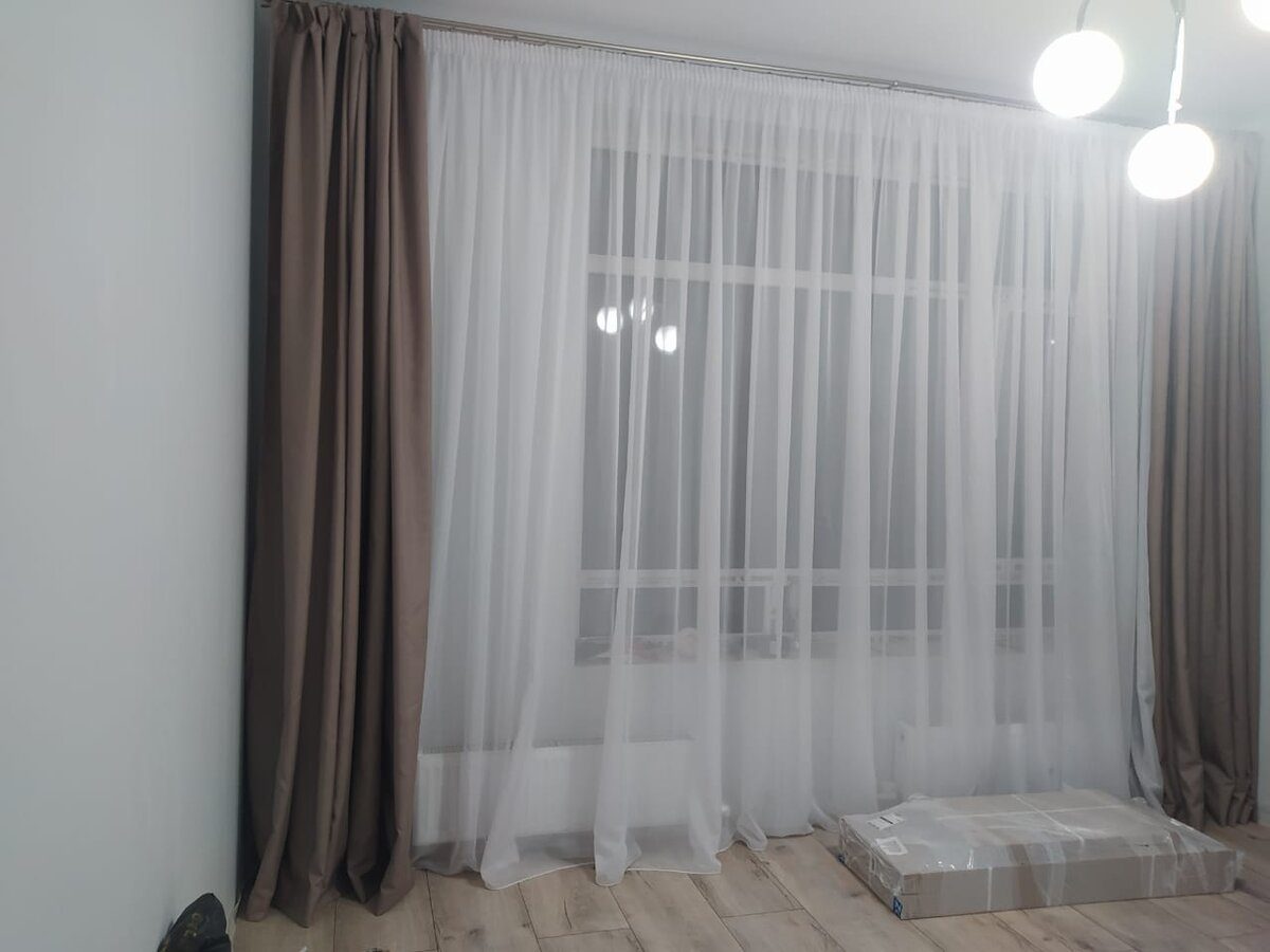 Експерти розповіли, як випрати старий сірий тюль до білосніжного стану, аби він був, як новий