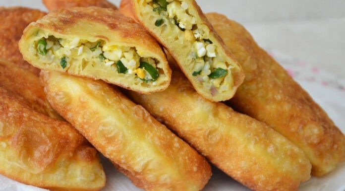 Пиріжки з рисом та яйцем, як колись у шкільній їдальні: секрет у пухкому тісті на 1 склянці кефіру Смажені пиріжки з рисом і яйцем на кефірному тісті